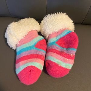 Pink, blue, and purple slipper socks with fluff